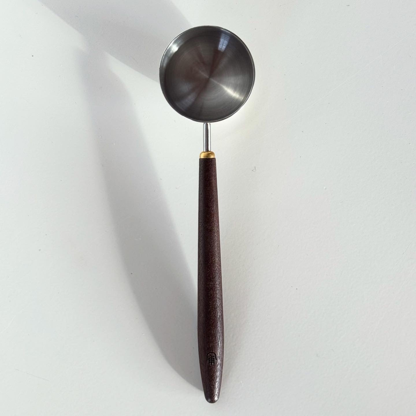 Measuring spoons in walnut (3x)