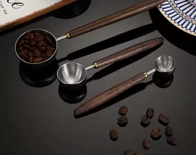 Measuring spoons in walnut (3x)